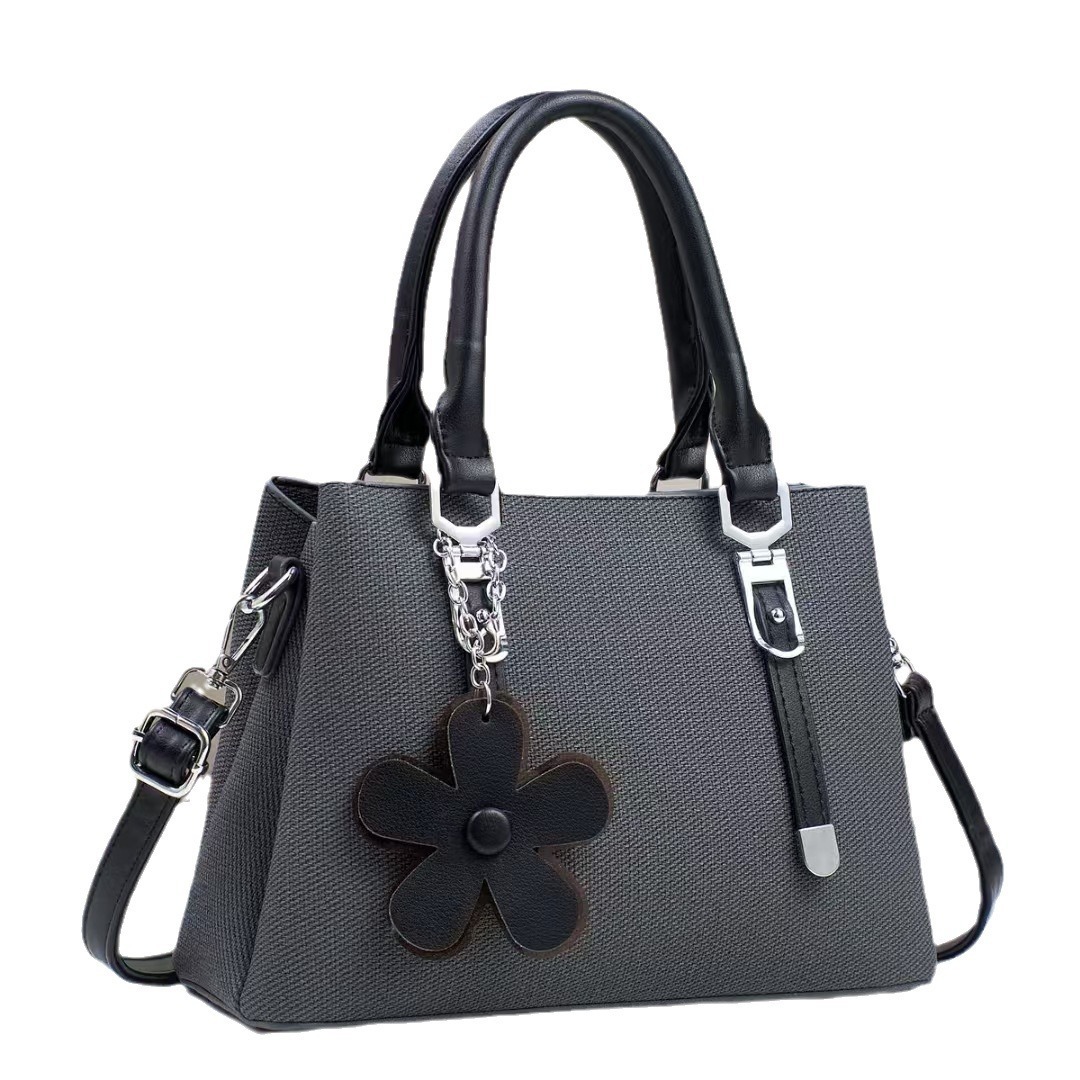 The new handbag is fashionable, elegant, simple and stylish. It has a large capacity and exquisite accessories. It is a single-shoulder crossbody women's bag for cross-border shipping Item Picture