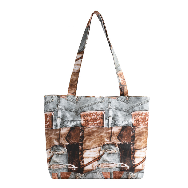 The 2024 new retro patchwork tote bag features a large capacity, a niche and high-end female design, and is a hand-held shoulder bag for college students attending classes Item Picture
