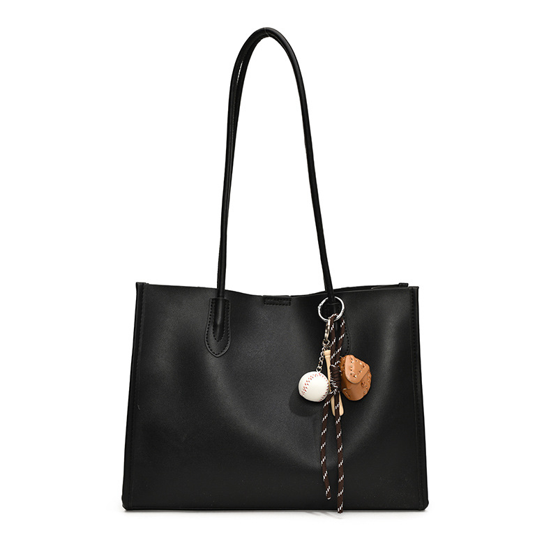 A new retro and simple tote bag for women in 2024 from a niche forest-themed commuter bag. It has a large capacity and is a versatile shoulder bag for classes Item Picture
