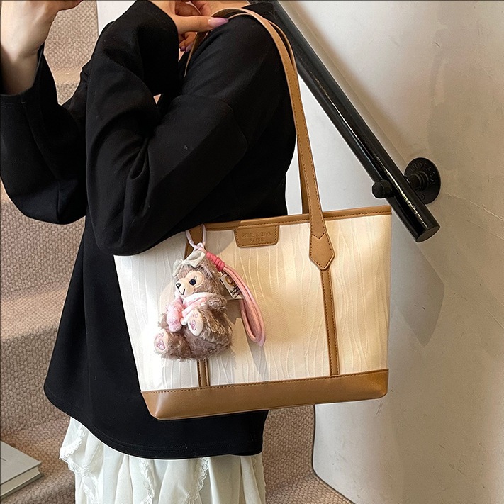 Fashionable color-blocking large-capacity tote bag for women 2025 new style, versatile and high-end solid color soft leather commuting single-shoulder bag full figure
