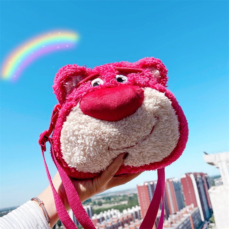 The 2023 new children's bag, a popular and trendy item, is a cute strawberry bear plush single-shoulder bag for girls, boys and babies going out full figure