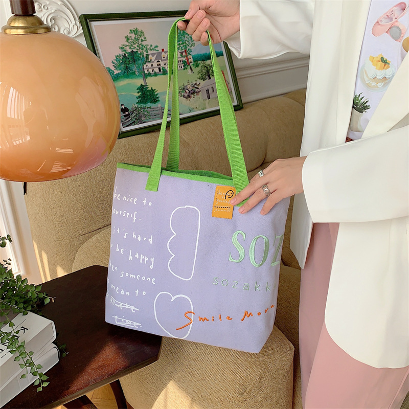 3612 New contrasting color woven strap canvas bag, ins embroidery single-shoulder bag, large-capacity female student tote bag Application Scenario
