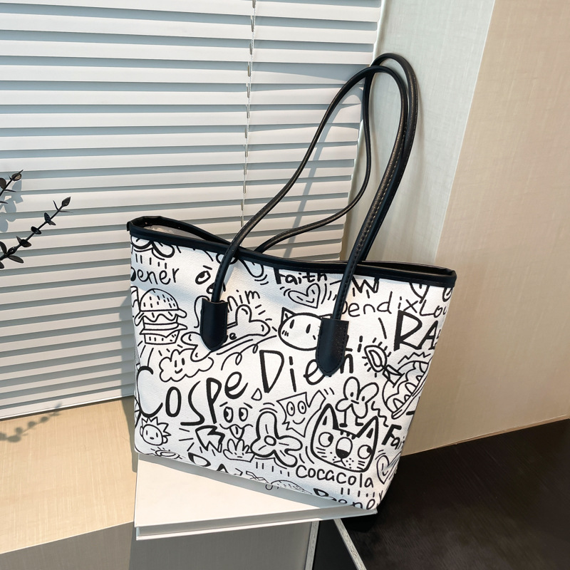 Japanese and Korean graffiti trend single-shoulder bags, versatile women's commuter and work handbags, large-capacity crossbody bags, and tote bags for classes full figure