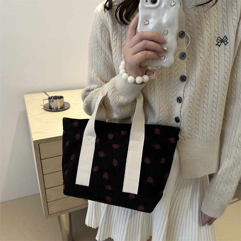 A cute Japanese strawberry corduroy handbag for women, new style 2024, fashionable and versatile, convenient to use as a small bag for mommy details Picture