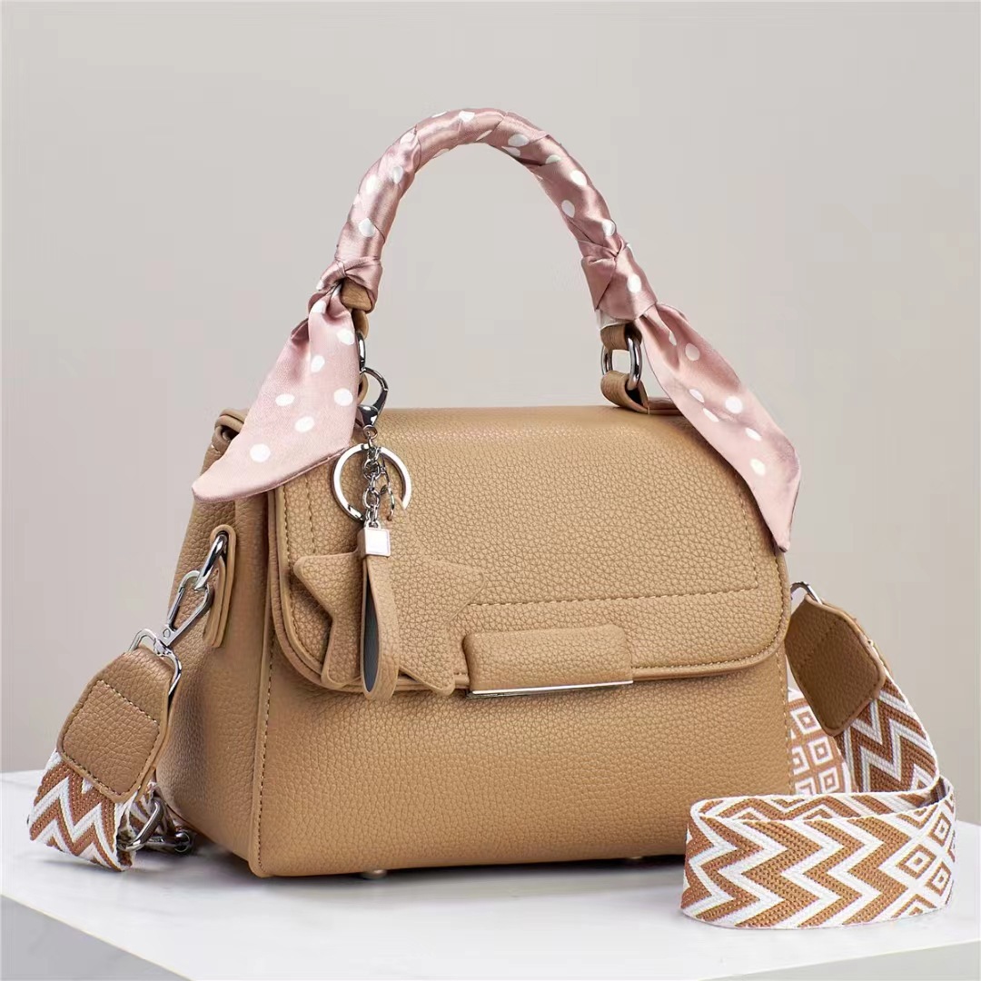 This is a new trendy single-shoulder crossbody handbag for women in 2024. It's a versatile summer bag with a soft leather texture and a light, small square shape Application Scenario