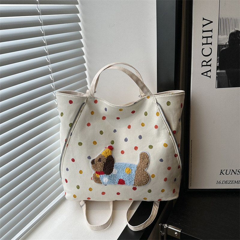 The new autumn Polka Dot Dog series is a high-end and fashionable backpack with a large capacity, simple and trendy, versatile women's bag and tote bag full figure