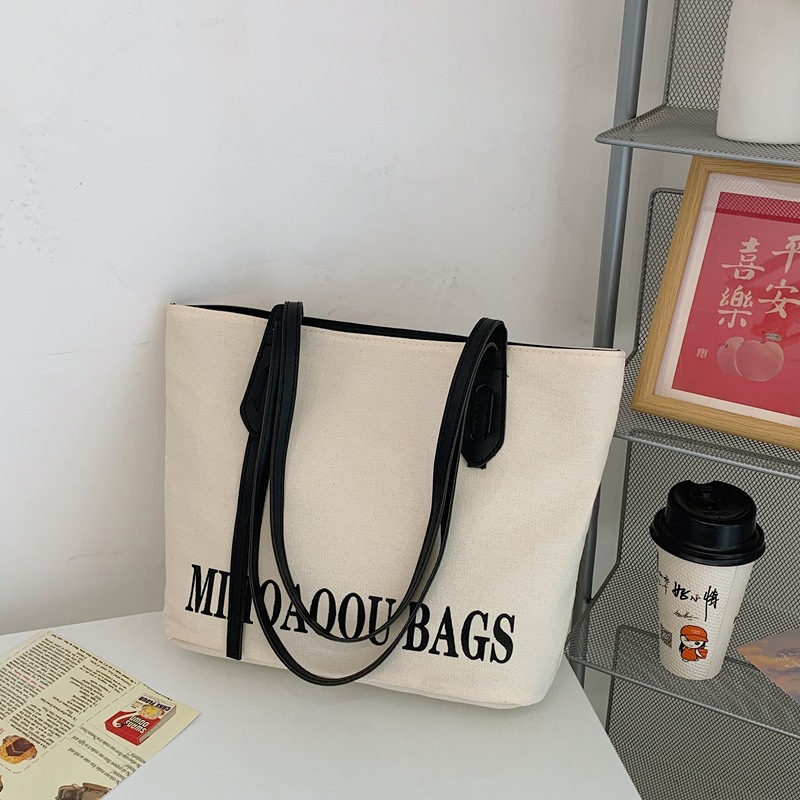 Tote bags' versatile new canvas women's bag for 2024 cross-border autumn and winter, large-capacity single-shoulder bag, color-matched commuting large bag full figure
