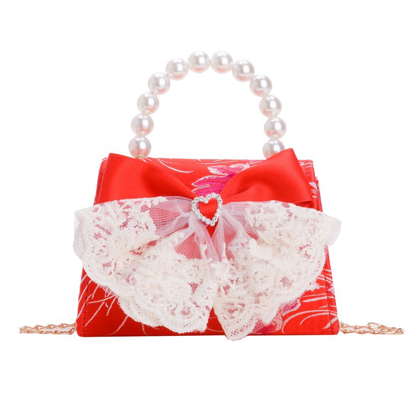 The new summer trendy children's bag, the fashionable little Chanel-style Elsa Princess bag, is a cute hand-held crossbody bag for little girls Item Picture
