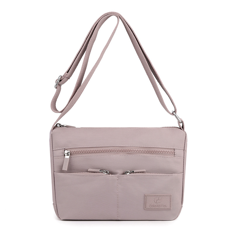 This is a new fashion and trendy crossbody bag for women in 2025. It is a casual and versatile waterproof backpack with a large capacity and multiple layers Item Picture