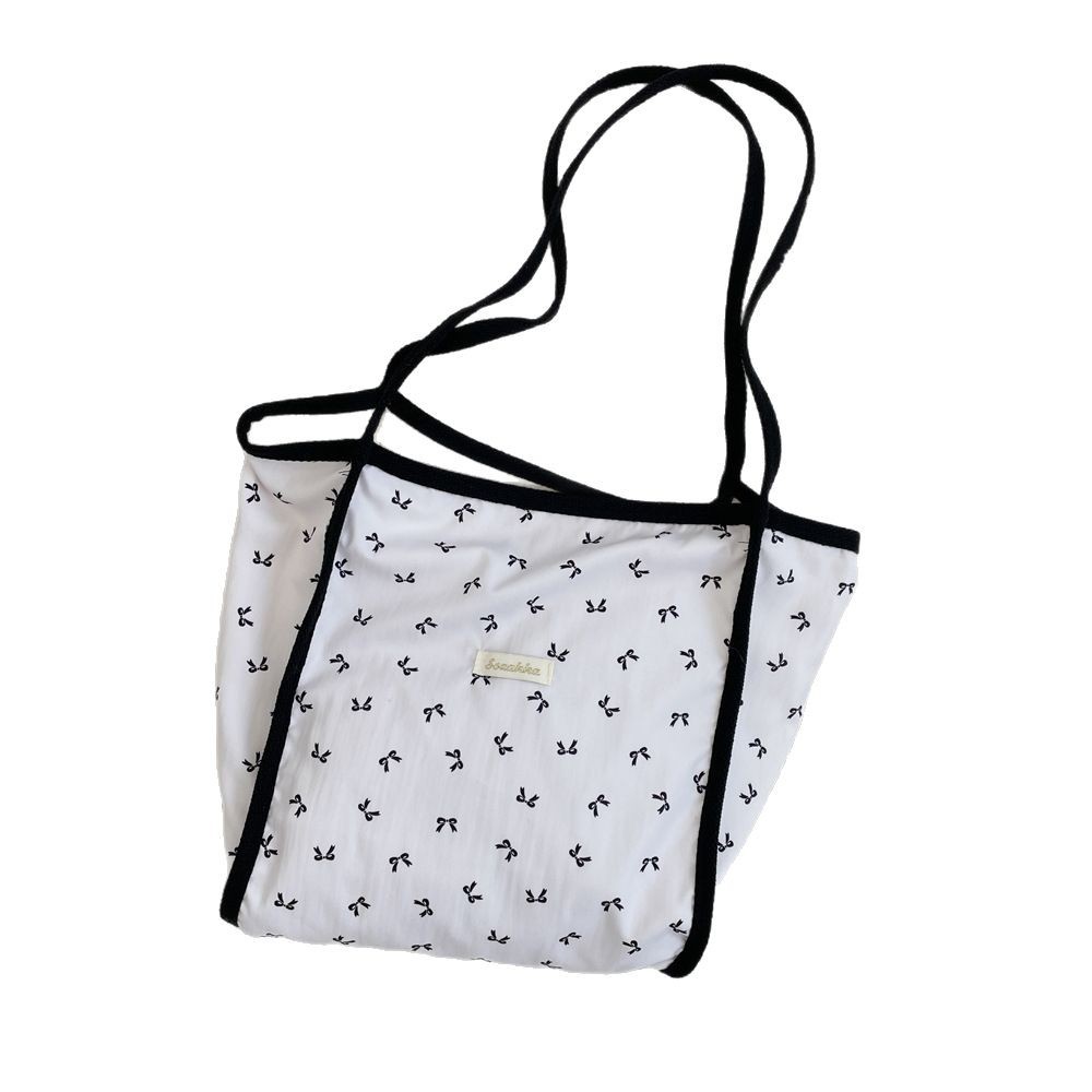54104 Large-capacity bag, new spring and summer women's single-shoulder bag, casual and stylish bow commuter tote bag Item Picture