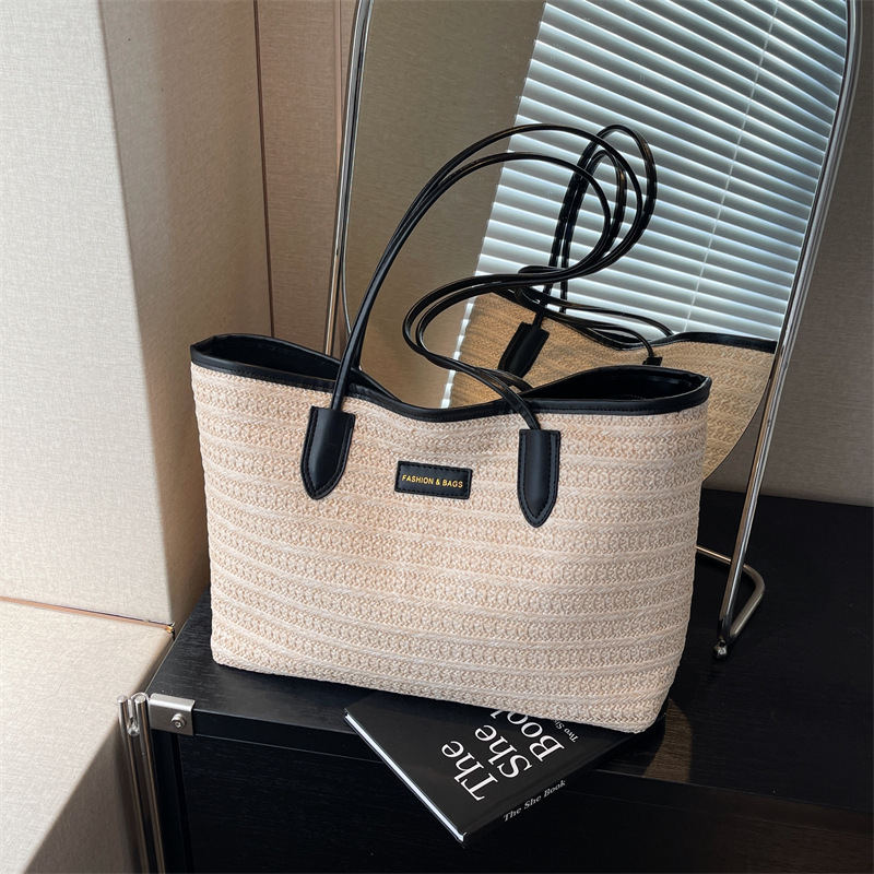 This year's popular tote bag is a high-capacity straw woven bag for women's commuting in 2024, which is fashionable, stylish and versatile details Picture