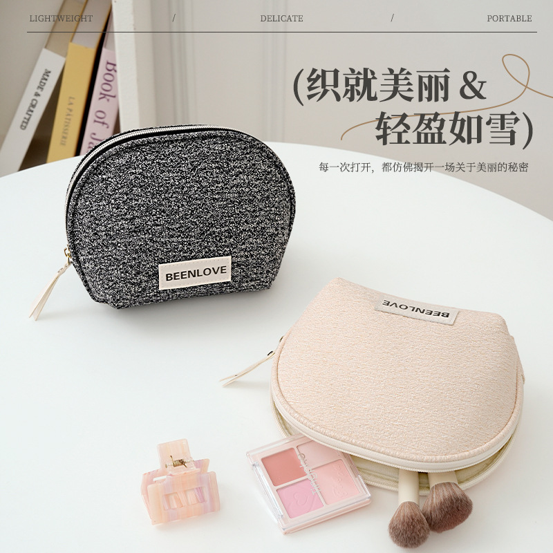 Runhui's new woven snow semi-circular makeup bag, travel cosmetics storage bag, mini hand-held small makeup bag, high appearance level full figure