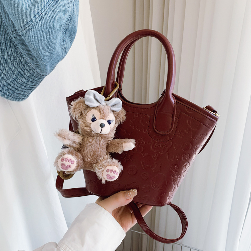 New hand-held bucket bag for women in summer 2025, a niche, simple and casual single-shoulder bag, a high-end and trendy commuter bag for women full figure