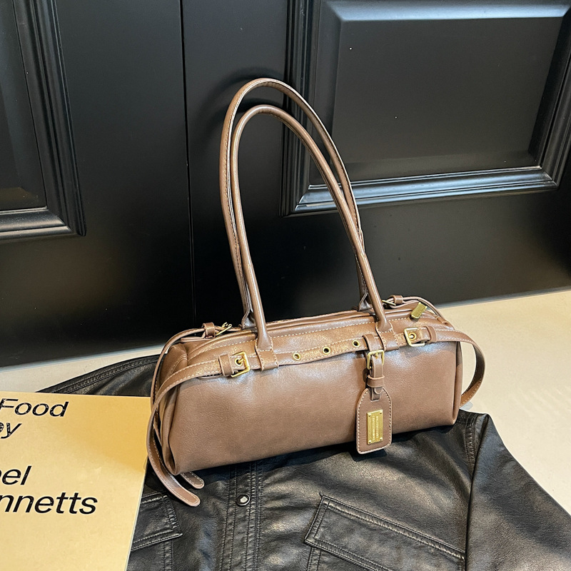 A new 2024 trendy and fashionable baguette underarm bag for women with a simple and niche Korean design for work and commuting details Picture