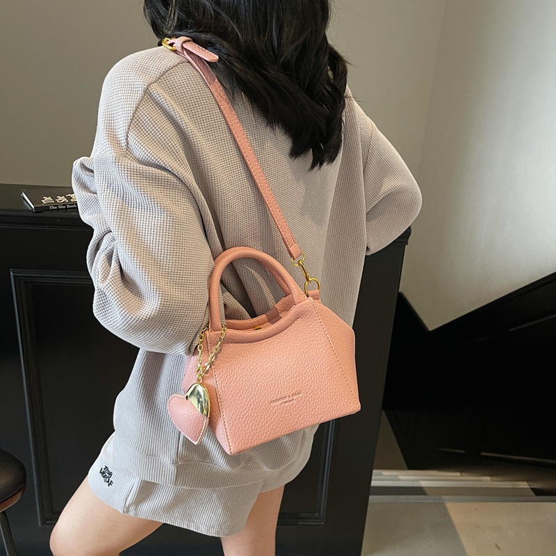 High-end, trendy and casual hand-held bucket bag for women, 2025 new Korean style, fashionable and niche design, single-shoulder crossbody bag details Picture