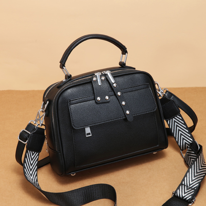 The 2024 new Korean-style solid color multi-pocket double-shoulder strap small square bag is a practical and elegant lady's commuting handbag full figure