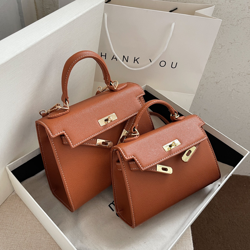 Customized factory wholesale cross-border bags, women's retro commuting hand-carried Kelly bags, casual women's single-shoulder crossbody bags full figure