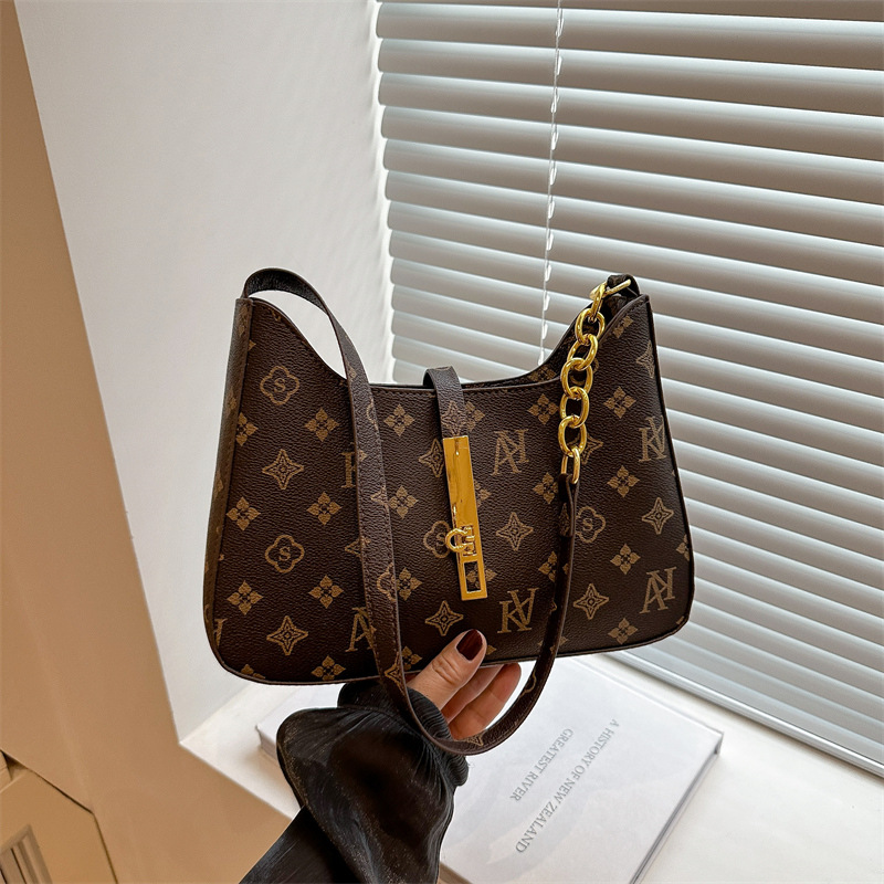 A trendy retro printed underarm bag for women, a new spring/Summer 2025 fashion single-shoulder bag, a simple and stylish handbag full figure