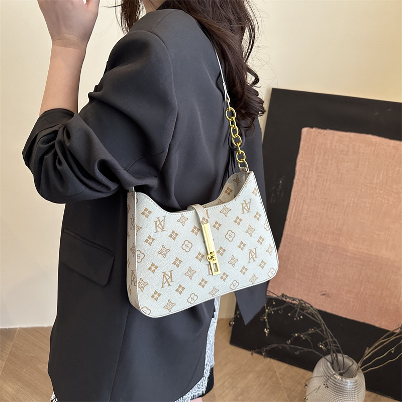 A trendy retro printed underarm bag for women, a new spring/Summer 2025 fashion single-shoulder bag, a simple and stylish handbag details Picture