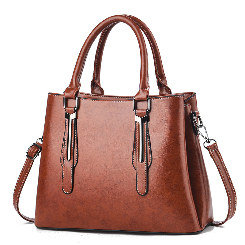 Wholesale of the 2025 new style fashionable retro solid color large-capacity practical single-shoulder crossbody handbag for women Item Picture