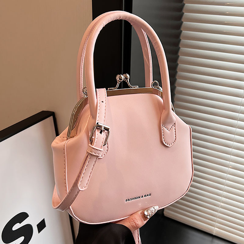 A new 2024 Korean-style niche design single-shoulder hand-carry bucket bag for women, a versatile and casual crossbody shell bag full figure