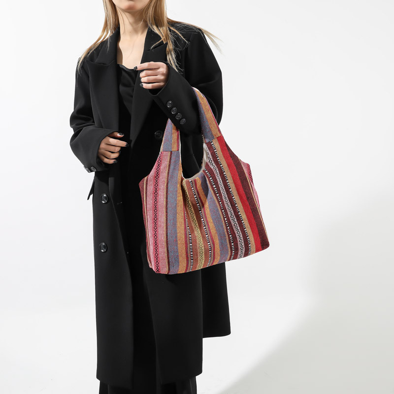 The 2024 new ethnic-style striped single-shoulder bag is fashionable, simple and has a large capacity slanted bucket details Picture