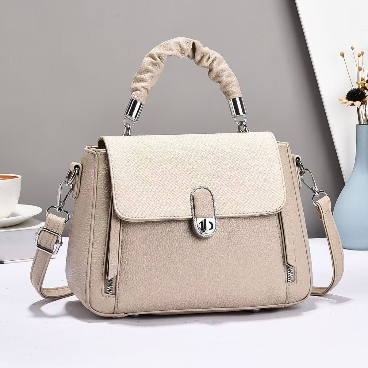 The new 2025 Korean handbag is a casual and versatile, high-quality single-shoulder bag with a niche design. It is a French hand-held women's bag details Picture
