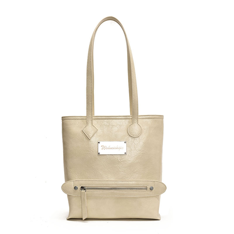 The 2025 new style of the work commuting tote bag for women is fashionable and versatile, with a large capacity single-shoulder bag and a high-end Korean-style underarm bag Item Picture