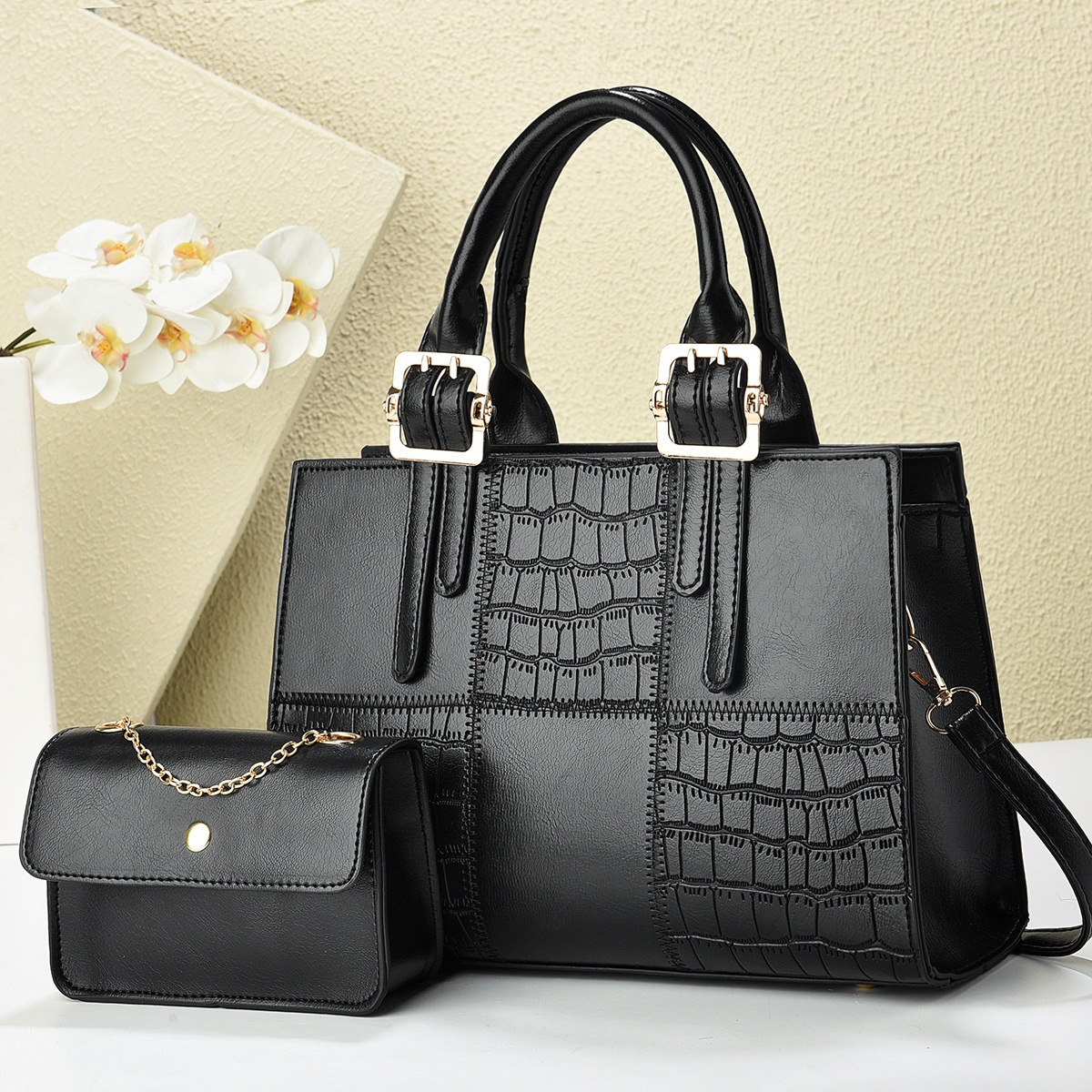 The new checkered stone pattern mother-and-child bag is fashionable and versatile, with a high level of appearance. It is a cross-border trend single-shoulder crossbody bag full figure