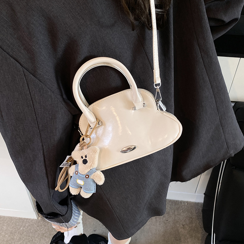 High-end quality and fashionable hand-held shell bag for women, 2025 new style, stylish and versatile single-shoulder bag, solid color simple crossbody bag details Picture