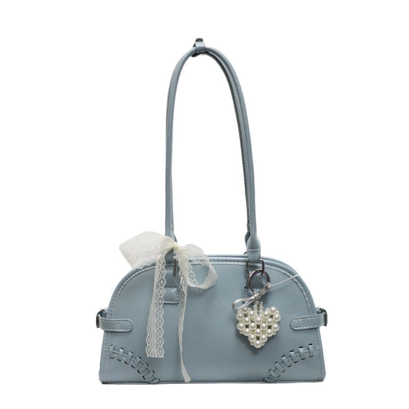 This stylish, simple and niche single-shoulder underarm bag is a versatile and casual commuter bowling bag for women. It is a new model handbag for 2025 Item Picture