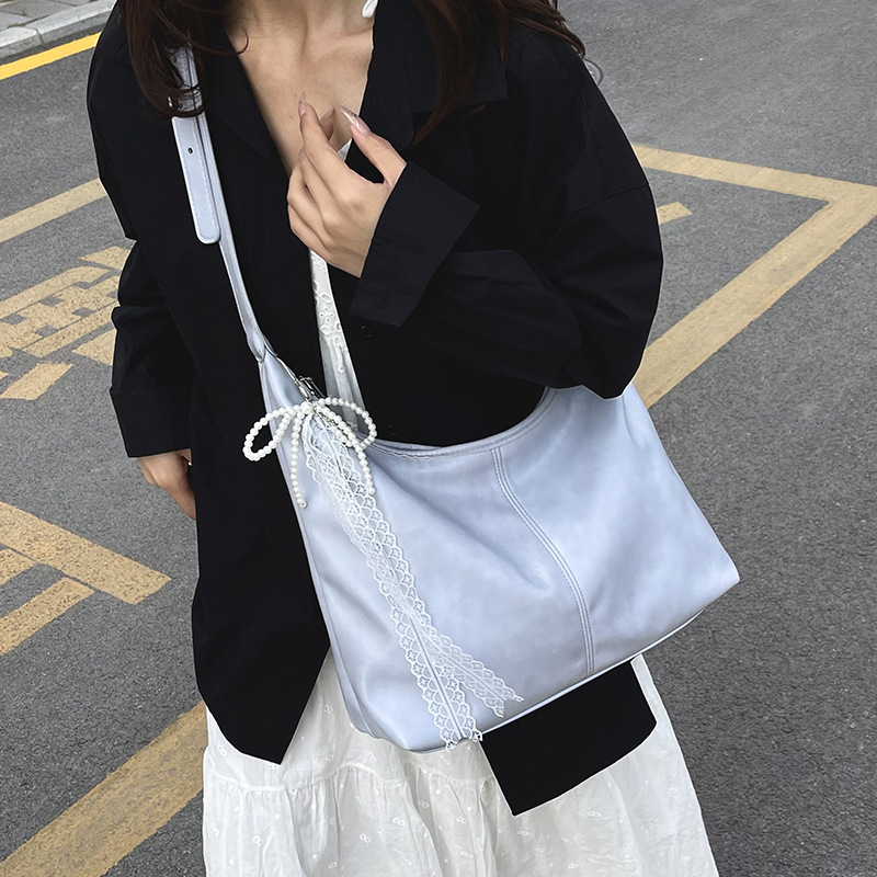 Korean large-capacity underarm bag for women 2025 new style fashionable single-shoulder bag, simple and versatile, popular commuter tote bag details Picture