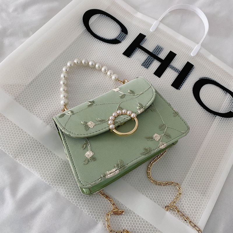 The new women's bags for summer 2022 are fashionable and stylish, featuring lace shoulder bags, crossbody bags, small square bags and pearl handbags full figure