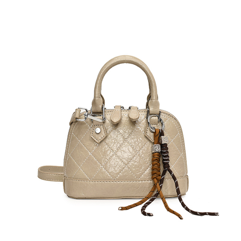 A niche, light luxury, high-end soft leather bag for women, 2024 new crossbody bag, texture handbag, versatile and fashionable shell bag Item Picture