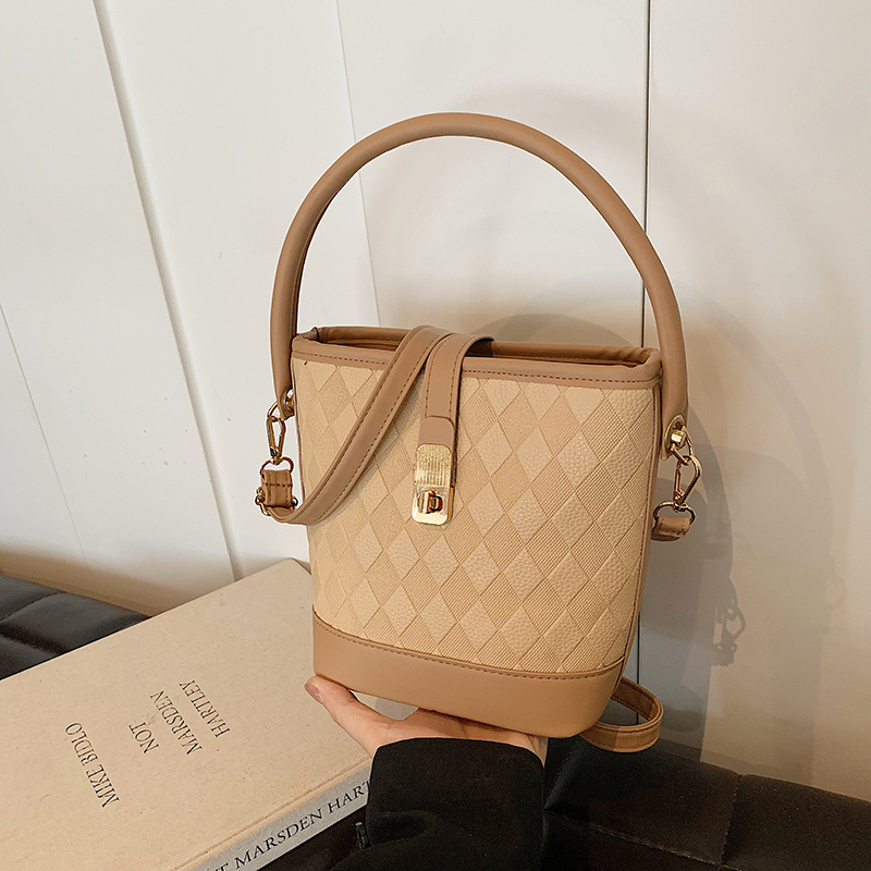 This year, the 2024 new summer versatile single-shoulder crossbody bag with a Korean-style hand-held bucket bag is in fashion full figure