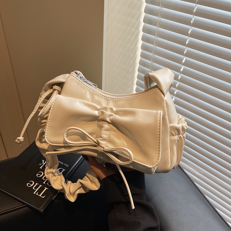A niche design pleated underarm bag for women, a new fashion bow crossbody bag with a high-end feel full figure