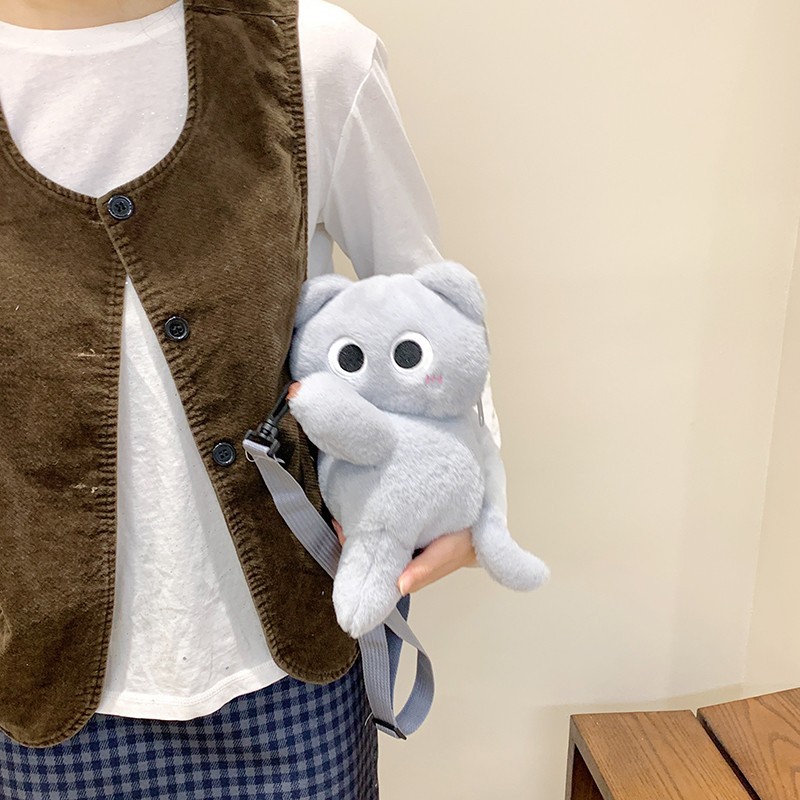 A large-capacity, girlish single-shoulder storage bag featuring a plush toy doll with a slant straddle in a cartoon style details Picture