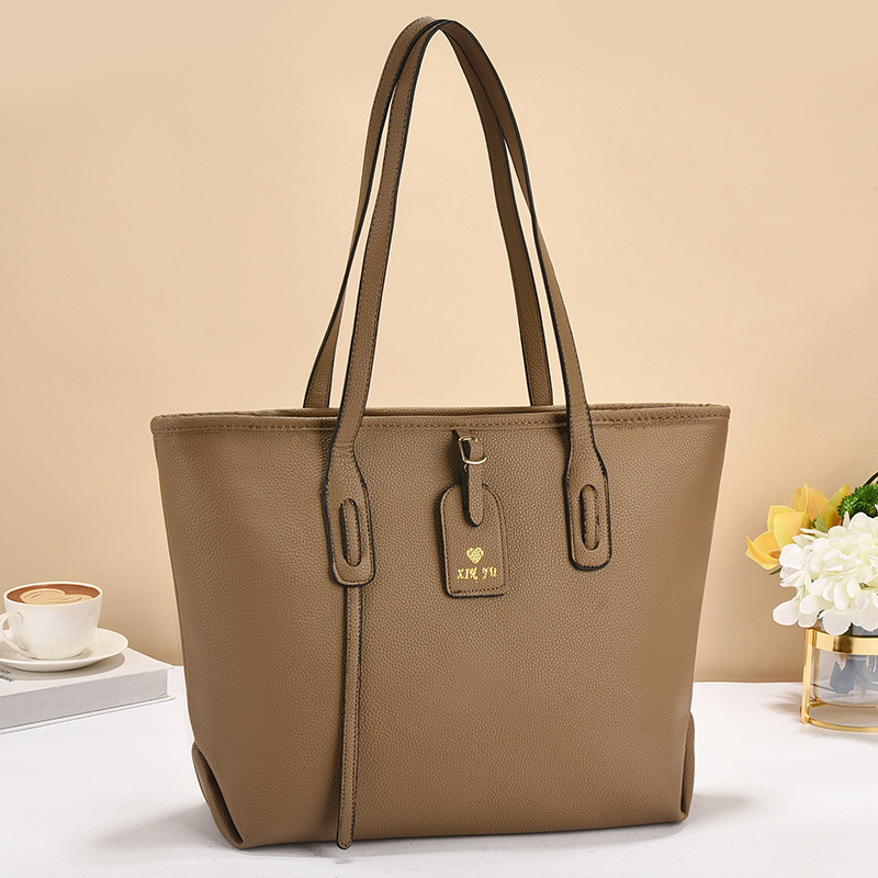 The new printed checkered bucket bag is a cross-border fashion handbag that is versatile, has a large capacity and a high-end feel. It is a single-shoulder crossbody bag details Picture