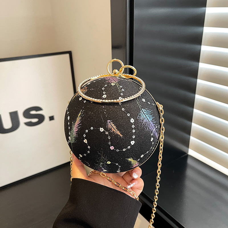 Fashionable and niche printed hand-held banquet bag for women, 2025 new spherical socialite dinner bag, chain single-shoulder crossbody bag full figure