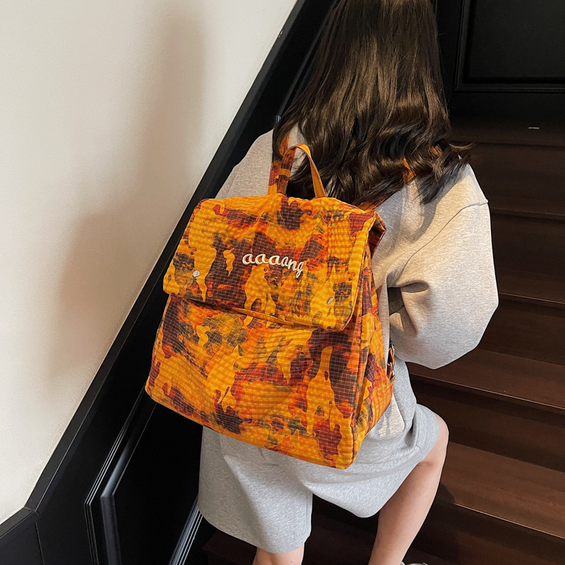 2025 New trendy water-dyed fabric camouflage large-capacity backpack for women, lightweight and portable letter travel backpack Specification drawing