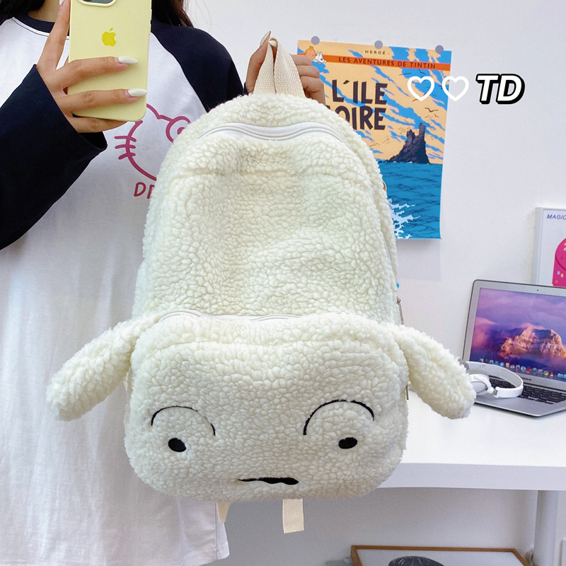 Cartoon Shin-chan's large-capacity backpack is cute and ugly. It's a funny and versatile backpack for college students' classes. Wholesale version full figure