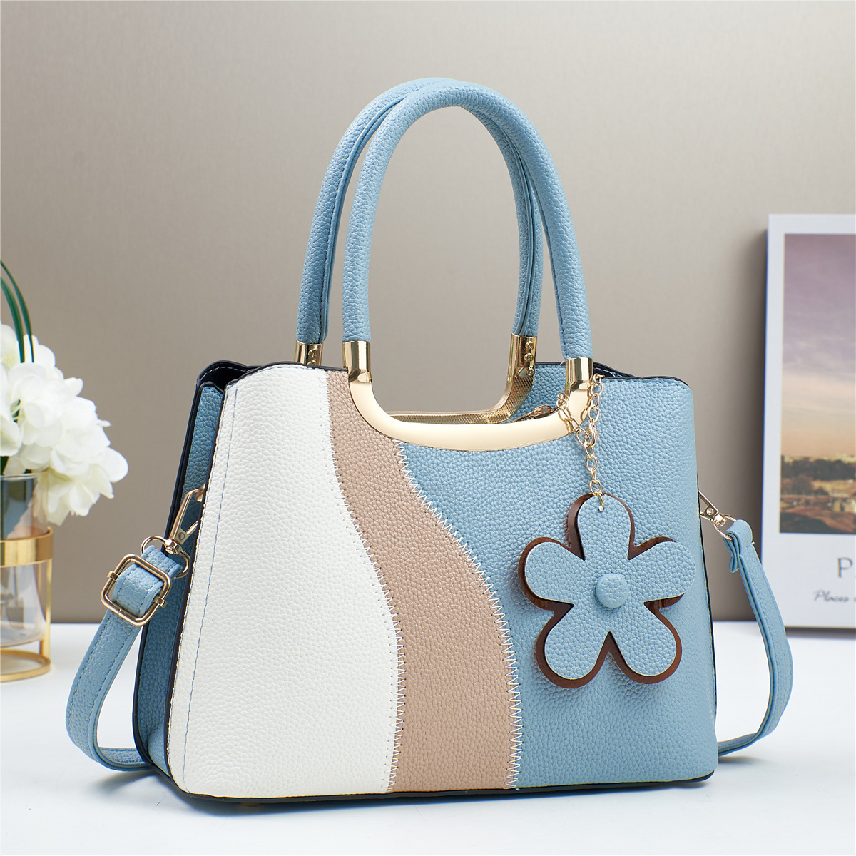 Wholesale of new 2024 European and American light luxury geometric color-blocking fashionable and trendy single-shoulder, crossbody and hand-carry mom bags full figure