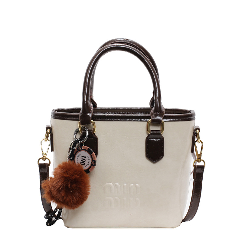 This year, the popular hand-held vegetable basket bucket bag for women in 2025 is a new, fashionable, high-end, light luxury and niche crossbody bag Item Picture