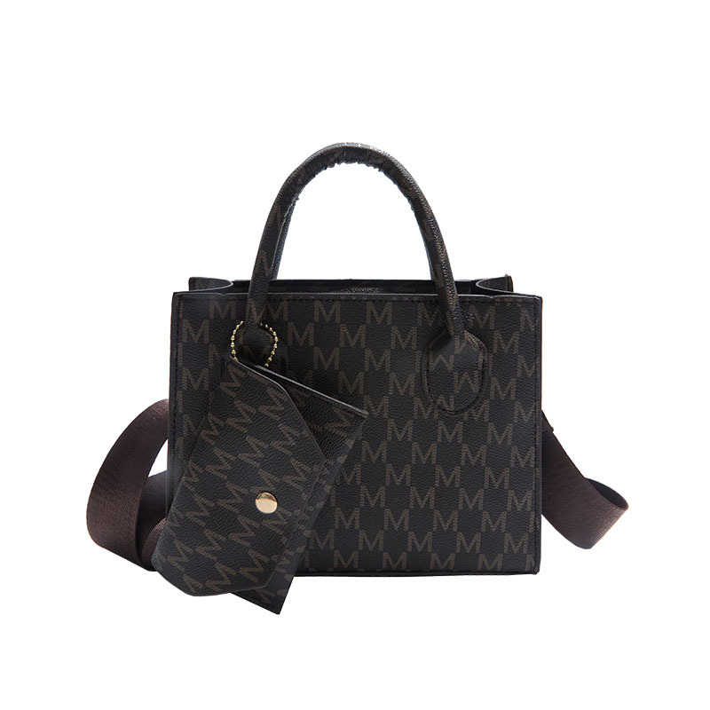 2025 New retro niche mini hand-held square bag for women, a high-end Korean style, fashionable and casual single-shoulder crossbody bag Item Picture