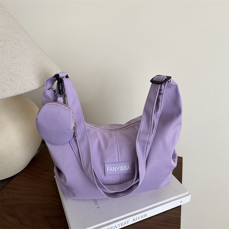 A stylish women's bag made of cloth, an ins large-capacity single-shoulder crossbody bag, a new 2025 lightweight, casual and artistic tote bag full figure