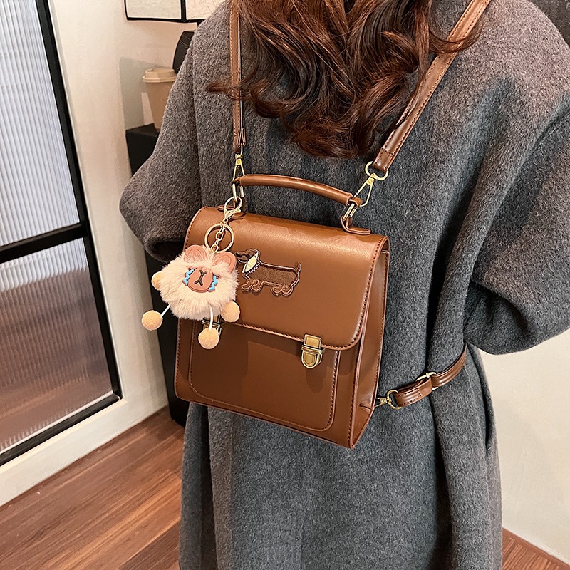Retro backpack for girls, 2024 new style fashionable student hand-held schoolbag, versatile crossbody bag, travel backpack for going out full figure