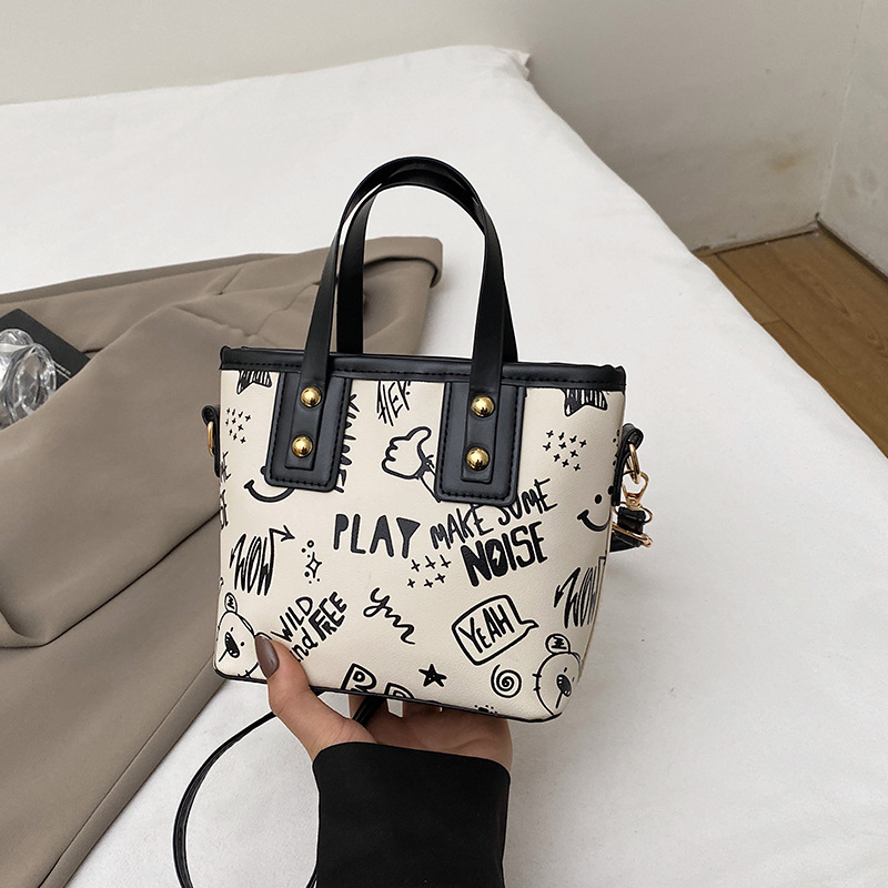 Large-capacity underarm bag, cute cartoon printed single-shoulder bag, new sweet and artistic tote bag for autumn and winter 2024 details Picture
