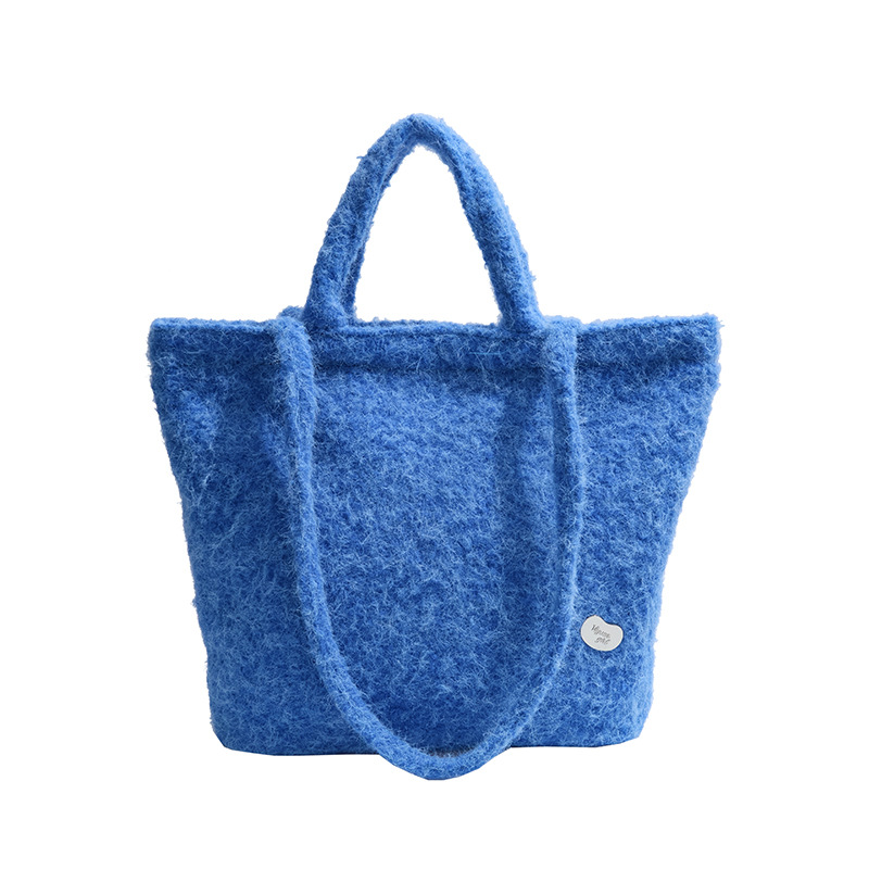 A hand-held plush tote bag for women, a Korean style Instagram fashion large-capacity single-shoulder bag, a new 2024 high-end commuter bag Item Picture