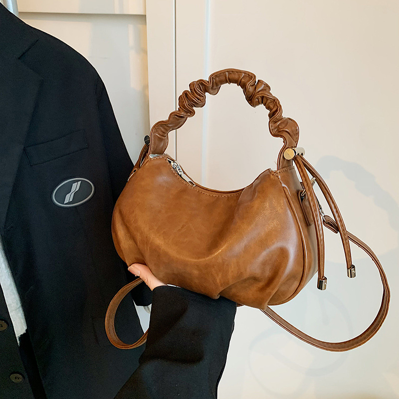 A high-end retro small bag for women, a new 2024 trendy and versatile crossbody bag, a fashionable and casual pleated hand-held small handbag details Picture