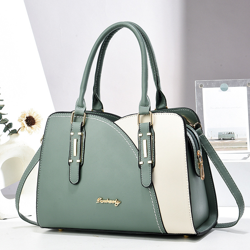 A simple and fashionable women's handbag with contrasting colors, a new single-shoulder crossbody bag for women in 2025, and a large-capacity commuter bag for women details Picture